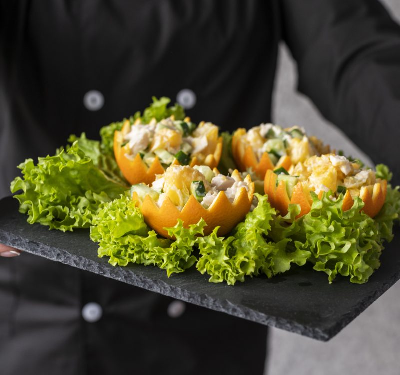 chef-presenting-dish-slate