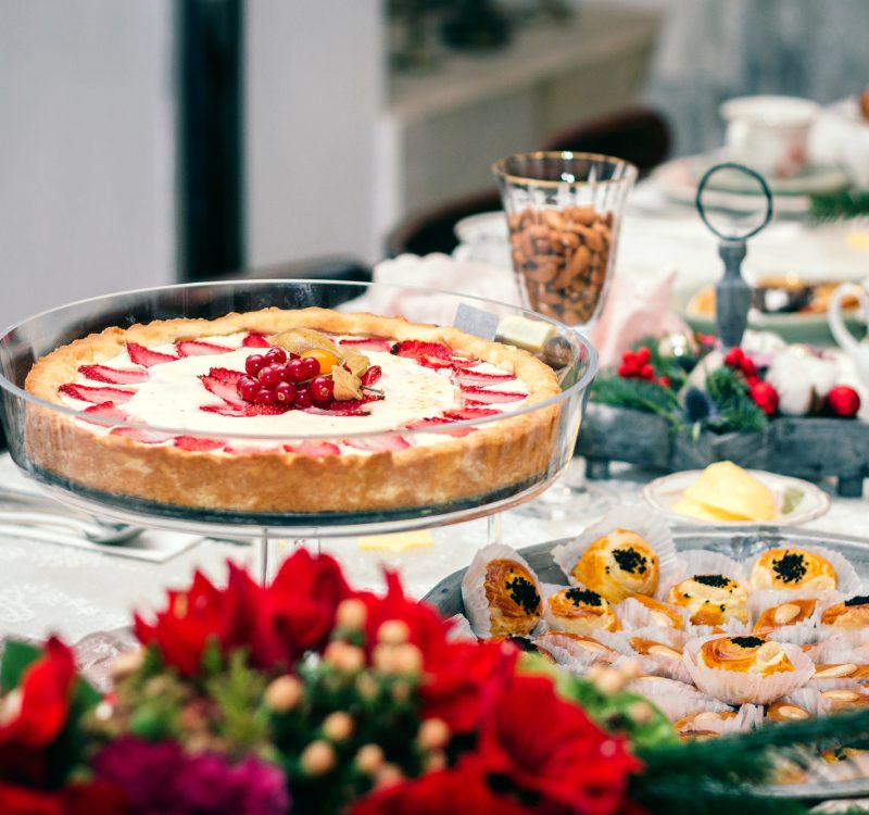 strawberry cake and plate with cookies